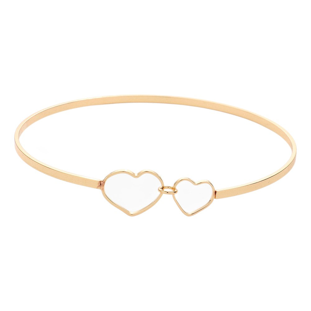 Gold Double Open Metal Heart Link Bangle Bracelet features a unique design that will add a touch of sophistication to any outfit. Made with high-quality metal, it is durable and comfortable to wear. The double open heart link adds a romantic touch, making it the perfect accessory for a date night or special occasion.