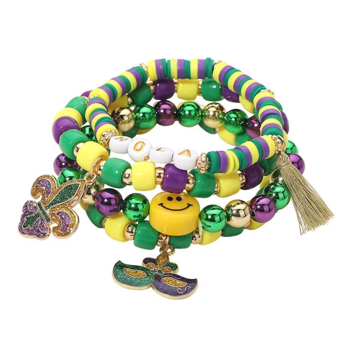Gold Green Purple Yellow This Mardi Gras charm beaded stretch bracelet set features playful bead designs accented with festive charms and fun focal details. Designed for comfortable stretch wear, each bracelet can be styled alone or stacked together, making it ideal for celebrations, themed events, party favors, and eye-catching seasonal accessory displays.