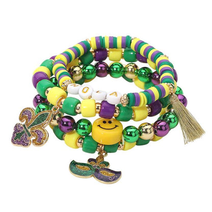Gold Green Purple Yellow This Mardi Gras charm beaded stretch bracelet set features playful bead designs accented with festive charms and fun focal details. Designed for comfortable stretch wear, each bracelet can be styled alone or stacked together, making it ideal for celebrations, themed events, party favors, and eye-catching seasonal accessory displays.
