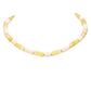 Gold Ivory Chunky Beaded Necklace is a versatile and stylish accessory for any outfit. Made with chunky beads, it adds a touch of elegance and texture to your look. Its bold design makes a statement while being comfortable to wear. Elevate your fashion sense with this eye-catching necklace.