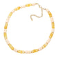 Gold Ivory Chunky Beaded Necklace is a versatile and stylish accessory for any outfit. Made with chunky beads, it adds a touch of elegance and texture to your look. Its bold design makes a statement while being comfortable to wear. Elevate your fashion sense with this eye-catching necklace.