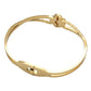 Gold Mother Of Pearl Stone Paved Stainless Steel Hinged Bangle Bracelet adds a touch of elegance to any outfit. The shimmering mother-of-pearl stones are intricately paved on a durable stainless steel hinged bangle, providing both style and durability. Elevate your jewelry collection with this stunning piece.