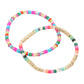Gold Multi 2PCS - Heishi Beaded Stretch Multi Layered Bracelets, Upgrade your bracelet game with these. This set includes two bracelets that are made with high-quality Heishi beads and stretchy elastic for a comfortable fit. The layered design adds a stylish touch to any outfit. Perfect for adding a pop of color to your look.