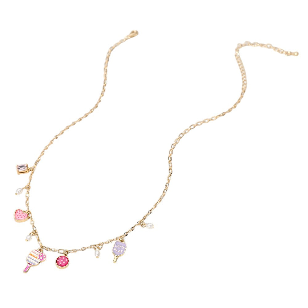 Gold Pink Let's Play Message Enamel Pickleball Pearl Charm Station Necklace is a must-have for any pickleball enthusiast. The stunning pearl charm and enamel design add a touch of elegance, while the "Let's Play" message promotes a sense of fun and camaraderie. Show off your love for this popular sport with style and grace.