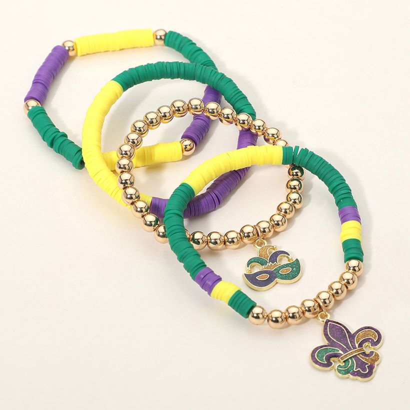 Gold, Purple , Yellow Celebrate festive moments with this Mardi Gras charm stretch bracelet set featuring layered bead textures and iconic themed charms. Designed for comfortable stretch wear, these bracelets are perfect for parades, parties, seasonal displays, and eye-catching accessory assortments.
