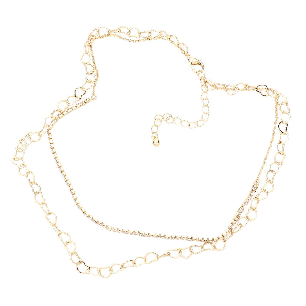 Gold Rhinestone Metal Open Heart Link Double Layered Necklace features a stunning combination of rhinestone-encrusted open heart links. This double-layered necklace will add a touch of elegance and glamour to any outfit, making it a perfect addition to your jewelry collection.