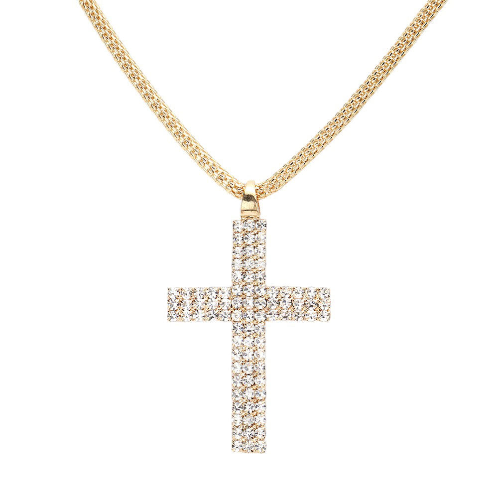 Gold Rhinestone Paved Cross Pendant Jewelry Set is exquisitely crafted from premium-grade metal alloy for a lasting shine. Its intricate design is adorned with shimmering rhinestones for an elegant look. The set includes a matching necklace and earrings. Perfect gift for religious friends and family members.