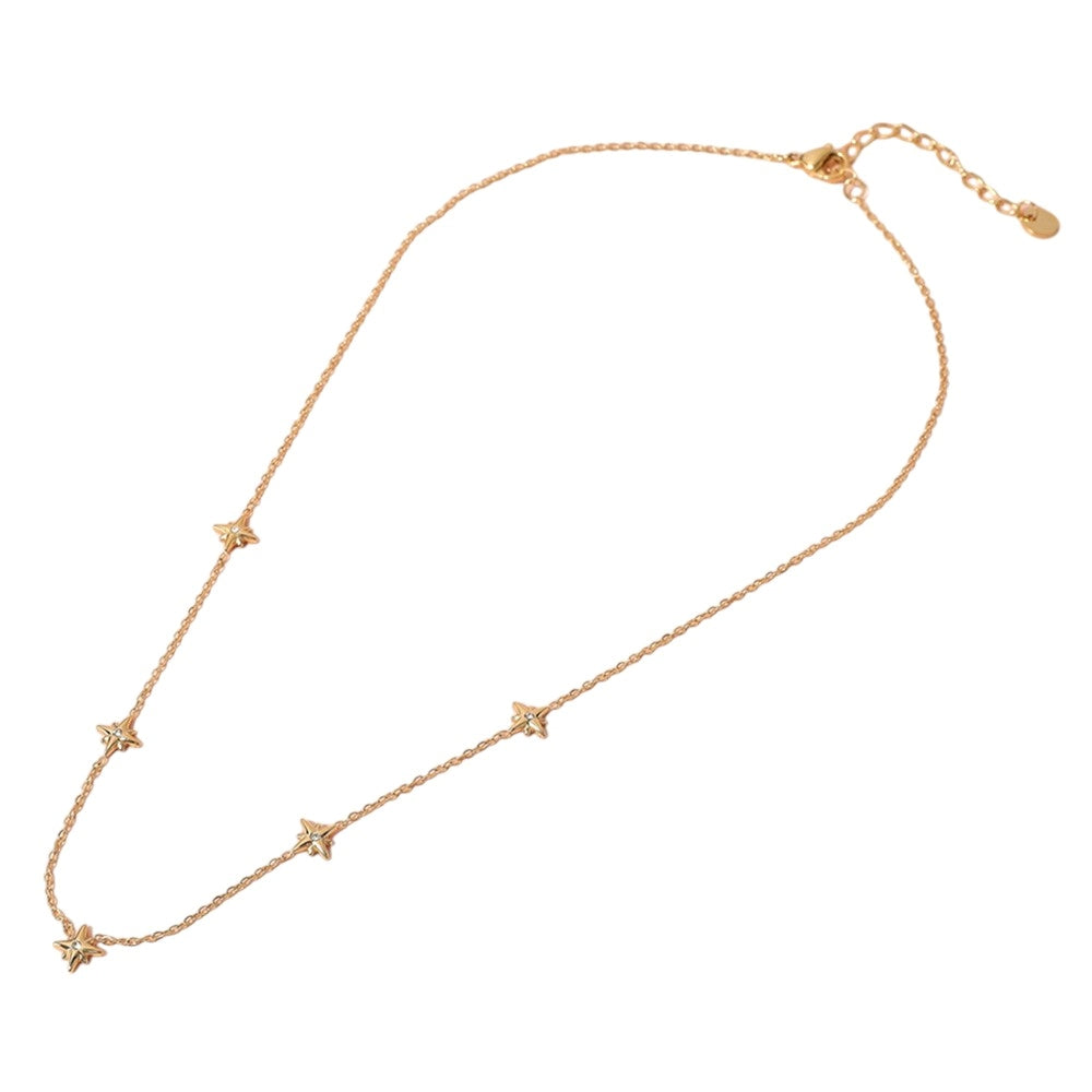 Gold SECRET BOX Stainless Steel Stone Starburst Station Necklace is a stunning piece of jewelry that will elevate any outfit. Made with high-quality stainless steel, it is durable and long-lasting. The unique starburst design with sparkling stones adds a touch of elegance and sophistication. Perfect for any occasion. 
