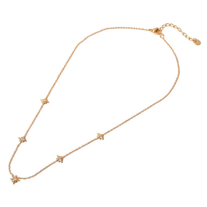 Gold SECRET BOX Stainless Steel Stone Starburst Station Necklace is a stunning piece of jewelry that will elevate any outfit. Made with high-quality stainless steel, it is durable and long-lasting. The unique starburst design with sparkling stones adds a touch of elegance and sophistication. Perfect for any occasion. 