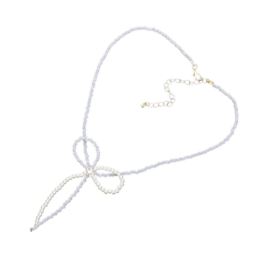Gold SECRET BOX_Stone Pointed Faceted Beaded Bow Necklace is expertly crafted with precision and style. The pointed faceted beads create a unique and eye-catching design, while the delicate bow adds a touch of elegance. Perfect for adding a sophisticated touch to any outfit.