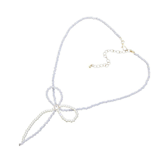 Gold SECRET BOX_Stone Pointed Faceted Beaded Bow Necklace is expertly crafted with precision and style. The pointed faceted beads create a unique and eye-catching design, while the delicate bow adds a touch of elegance. Perfect for adding a sophisticated touch to any outfit.
