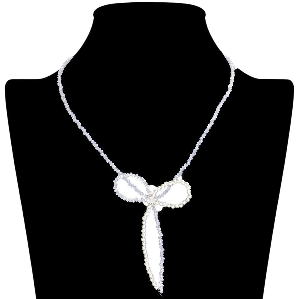 Gold SECRET BOX_Stone Pointed Faceted Beaded Bow Necklace is expertly crafted with precision and style. The pointed faceted beads create a unique and eye-catching design, while the delicate bow adds a touch of elegance. Perfect for adding a sophisticated touch to any outfit.