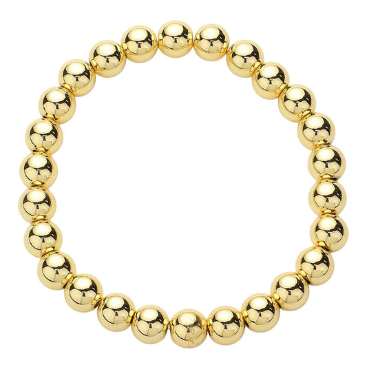 Gold Stainless Steel ball-beaded stretch Bracelet is made with durability and style in mind. The stainless steel material provides long-lasting wear, and the beaded design adds a touch of elegance. Perfect for any occasion, this bracelet effortlessly elevates any look.