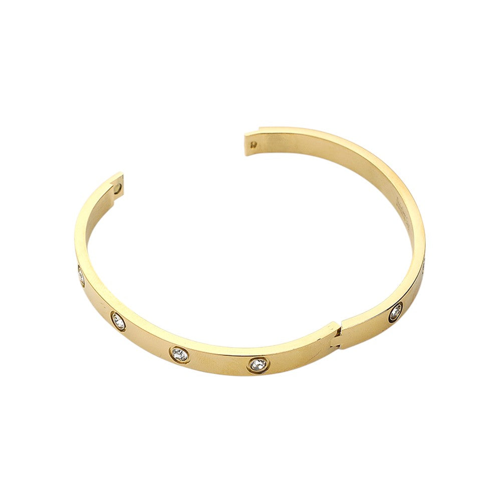Gold Stainless Steel Crystal Embellished Bangle Evening Bracelet is a must-have accessory for any evening event. Made with durable stainless steel and adorned with dazzling crystals, this bracelet adds a touch of elegance and sophistication. Perfect for a formal dinner or a night out on the town.