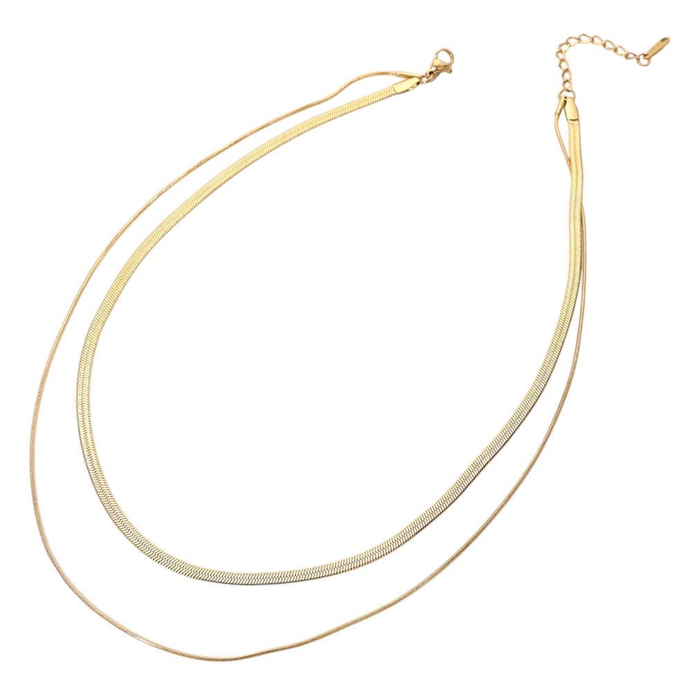 Gold stainless steel herringbone rope chain layered necklace is a versatile and stylish addition to your jewelry collection. Made with durable stainless steel, it offers a sleek and modern look that is perfect for both casual and formal occasions. Elevate your style with this statement piece.