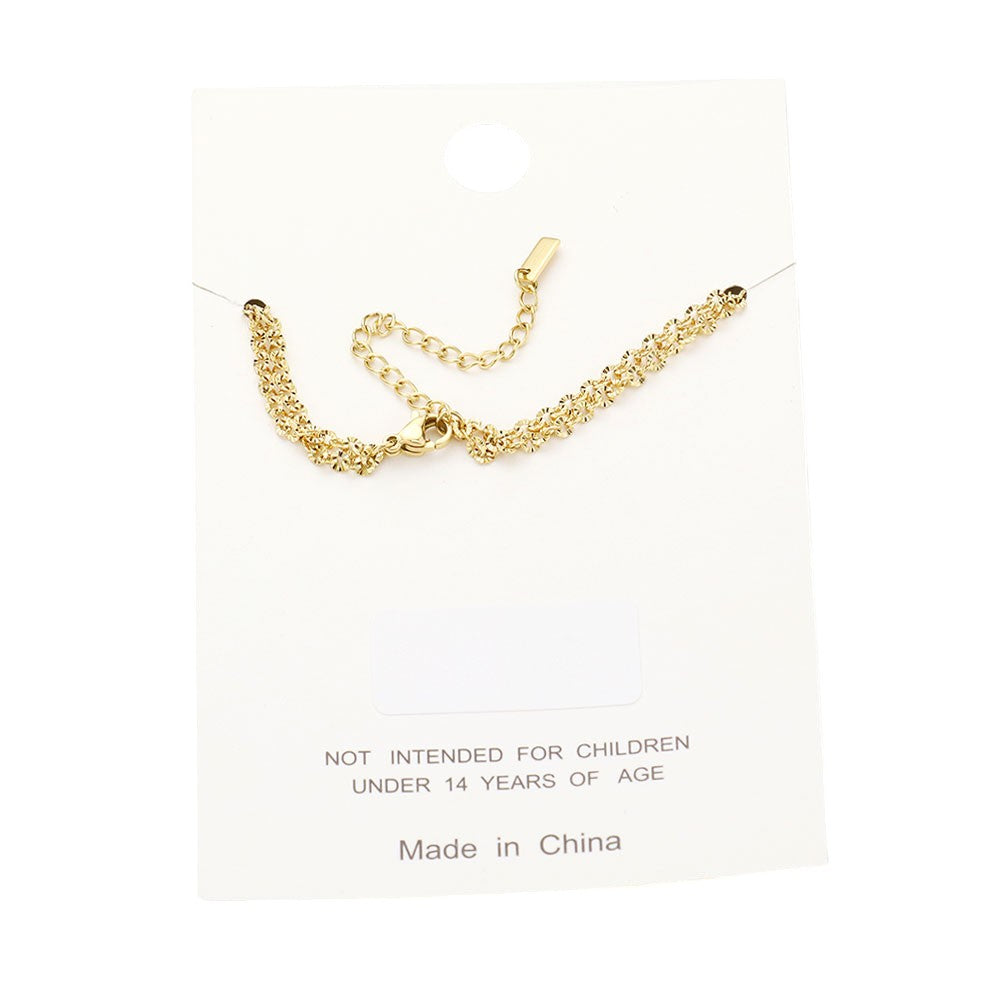 Gold Stainless Steel Metal Chain Double Layered Anklet is a durable and stylish accessory for any outfit. Made from high-quality stainless steel, it offers a sleek and modern look while also being strong and long-lasting. With two layers of chain, it adds an elegant touch to your ankle and can be easily paired with any shoe. It is a must-have for any fashion-forward individual.