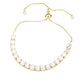 Gold Stainless Steel Round CZ Stone Tennis Chain Pull Tie Adjustable Bracelet is the perfect combination of style and functionality. Crafted with high-quality stainless steel, it offers durability and a chic aesthetic. The adjustable pull tie feature ensures the perfect fit, while the sparkling CZ stones add a touch of elegance. Elevate any outfit with this must-have accessory.