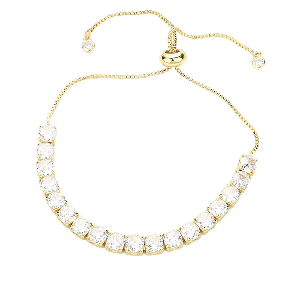Gold Stainless Steel Round CZ Stone Tennis Chain Pull Tie Adjustable Bracelet is the perfect combination of style and functionality. Crafted with high-quality stainless steel, it offers durability and a chic aesthetic. The adjustable pull tie feature ensures the perfect fit, while the sparkling CZ stones add a touch of elegance. Elevate any outfit with this must-have accessory.