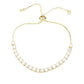 Gold Stainless Steel CZ Stone Tennis Chain Pull Tie Adjustable Bracelet is a sleek and stylish addition to any outfit. With its adjustable design and sparkling CZ stones, it offers the perfect fit and a touch of luxury. Made with high-quality stainless steel, it is also durable and long-lasting. Elevate your accessory game with this timeless piece.