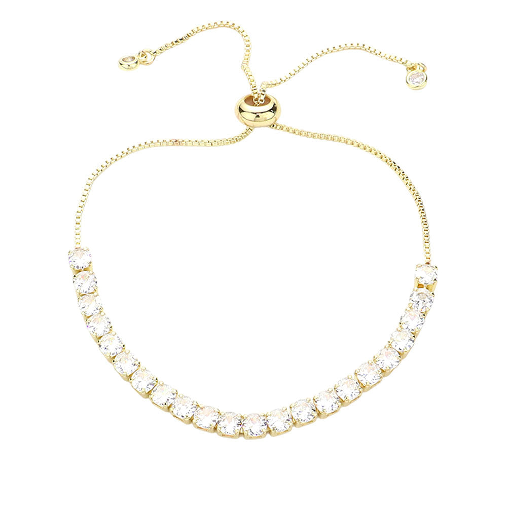 Gold Stainless Steel CZ Stone Tennis Chain Pull Tie Adjustable Bracelet is a sleek and stylish addition to any outfit. With its adjustable design and sparkling CZ stones, it offers the perfect fit and a touch of luxury. Made with high-quality stainless steel, it is also durable and long-lasting. Elevate your accessory game with this timeless piece.