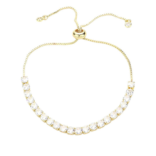 Gold Stainless Steel CZ Stone Tennis Chain Pull Tie Adjustable Bracelet is a sleek and stylish addition to any outfit. With its adjustable design and sparkling CZ stones, it offers the perfect fit and a touch of luxury. Made with high-quality stainless steel, it is also durable and long-lasting. Elevate your accessory game with this timeless piece.