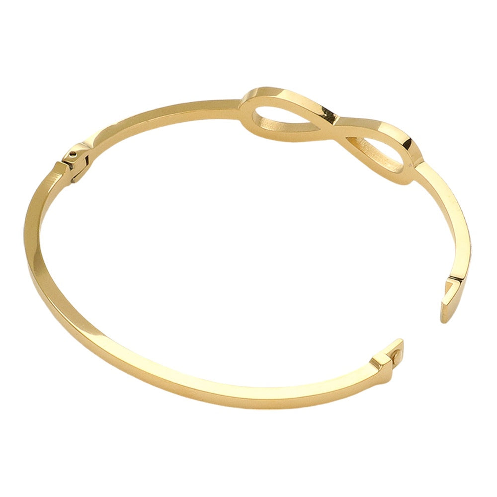 Gold Stainless steel bangle bracelet features a timeless infinity design and is intricately paved with shimmering stones. Made with durable stainless steel, it is both stylish and durable. Elevate your jewellery collection with this versatile and elegant piece that will add a touch of sophistication to any outfit.