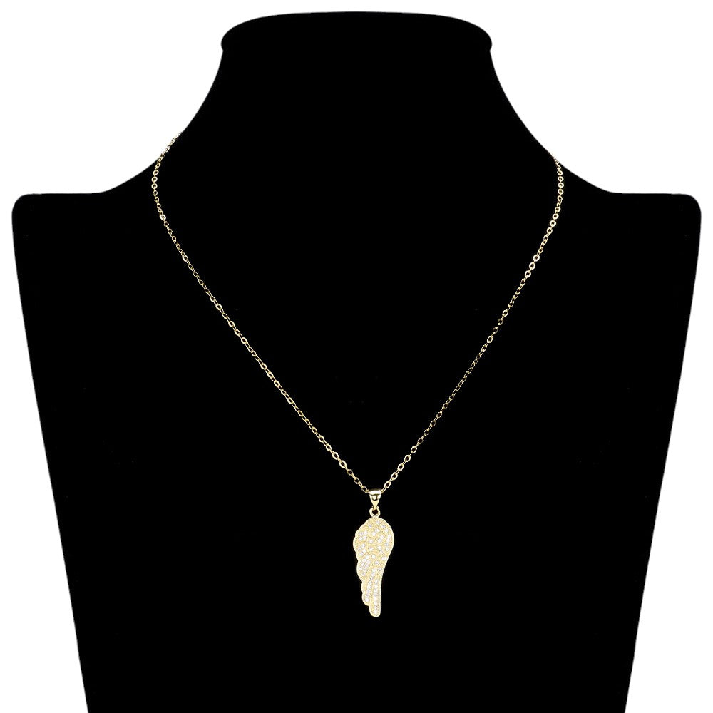 Gold Stainless Steel Stone Paved Wing Pendant Necklace is a unique and stylish piece of jewelry that is perfect for any occasion. Made with high-quality stainless steel, it is durable and resistant to tarnishing. The intricate pave design adds a touch of elegance, making it a perfect addition to any outfit. Elevate your style with this eye-catching necklace.