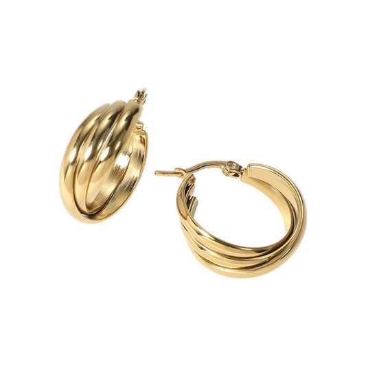 Gold Stainless Steel Twisted Pin Catch Hoop Earrings are a must-have for any jewelry collection. Made from high-quality stainless steel, they are durable and will not tarnish. The unique twisted design adds a touch of elegance to any outfit. With a secure pin catch closure, these earrings are perfect for everyday wear or special occasions.