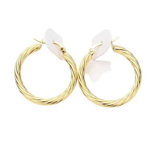 Gold Twisted Stainless Steel Hoop Pin Catch Earrings are expertly crafted with durability and style in mind. Made from high-quality stainless steel, these earrings are strong and resistant to tarnishing. With their unique twisted design, they add a touch of sophistication to any outfit and are secured with a convenient pin catch closure.