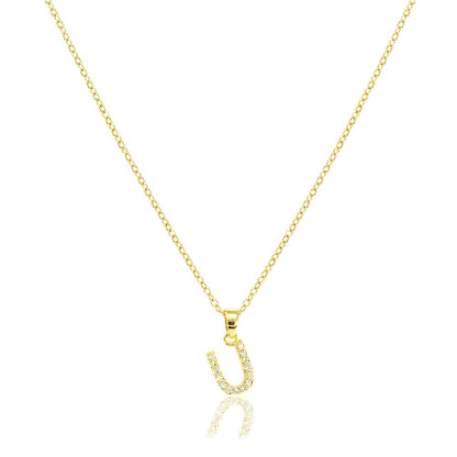 Gold U Stainless Steel CZ Stone Paved Monogram Pendant Necklace features a stunning and unique design. The high-quality stainless steel construction and CZ stone pave detailing ensures durability and add a touch of elegance. Perfect for accessorizing any outfit and making a personalized statement.