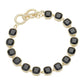 Gold Jet Black 14K Gold Plated Square CZ Stone Link Evening Toggle Bracelet adds a touch of elegance to any outfit. The sparkling CZ stones and sturdy toggle clasp make it the perfect accessory for special occasions. Enjoy the luxurious look and feel of this high-quality bracelet