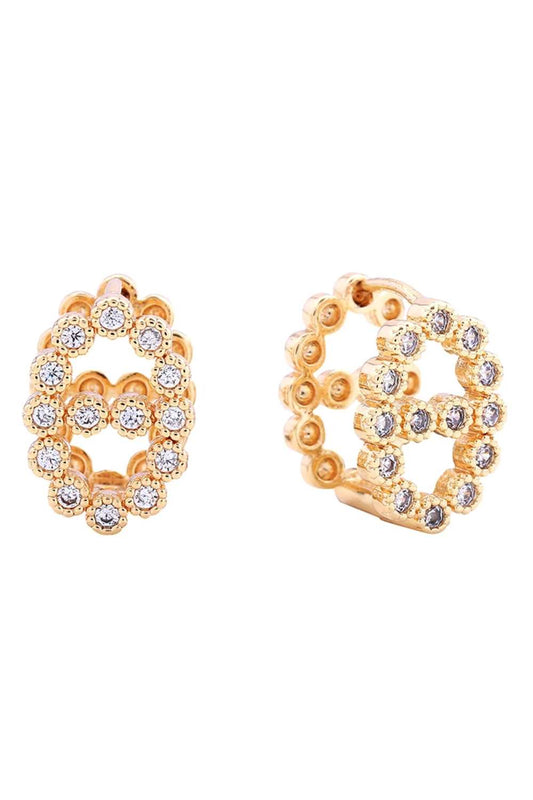 Gold Elevate your everyday look with these stunning 14K Bling Farandole Pave CZ Huggie Earrings. Crafted from hypoallergenic brass and adorned with sparkling cubic zirconia pavé detailing, these versatile huggie earrings deliver maximum shine in a compact 1.5cm diameter design. Perfect for sensitive ears, they're lead and nickel compliant for worry-free wear. Whether you're dressing up or keeping it casual, these brilliant beauties add instant glamour to any occasion.