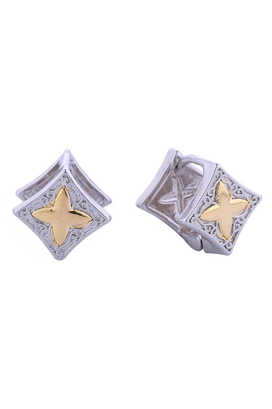 Gold Delicate clover leaf huggies crafted in brass with 14K gold and white dipping. These hypoallergenic earrings feature a charming 1.2cm diameter design, perfect for everyday elegance. Lead and nickel compliant for sensitive skin. A timeless piece that adds subtle sophistication to any look.
