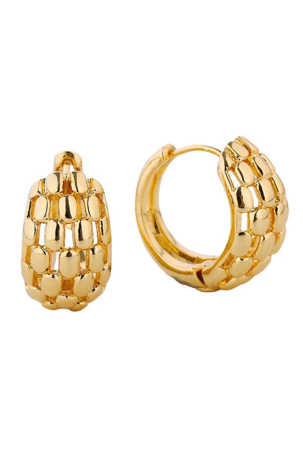 Gold Delicate 14K gold and white gold dipped huggie hoops crafted from hypoallergenic brass. These petite hoops feature a 2.11cm diameter, perfect for a subtle everyday look. Lead and nickel compliant for sensitive skin. Lightweight, versatile, and designed to hug the earlobe with effortless elegance.