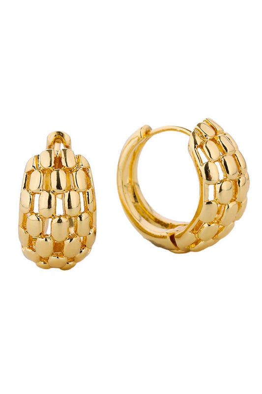 Gold Delicate 14K gold and white gold dipped huggie hoops crafted from hypoallergenic brass. These petite hoops feature a 2.11cm diameter, perfect for a subtle everyday look. Lead and nickel compliant for sensitive skin. Lightweight, versatile, and designed to hug the earlobe with effortless elegance.