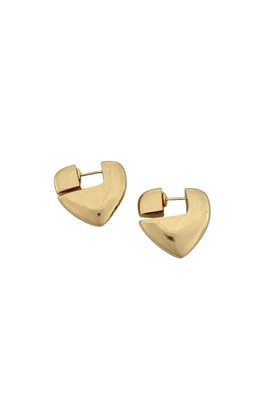 Gold Elegant huggie hoops with a luxurious 14K gold and white gold dip finish. Made from hypoallergenic brass, these earrings are perfect for sensitive ears. The compact 2.01cm diameter hugs close to the lobe for a sleek, contemporary look. Lead and nickel compliant for safe, worry-free wear. A versatile staple that works with any style, from minimalist to bold.