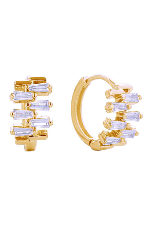 Gold Elevate your everyday look with these stunning 14K Gold/White Gold Dipped Huggie Earrings. Featuring a playful disorganized cubic zirconia design, these petite 1.8cm earrings deliver maximum sparkle in a minimalist silhouette. Crafted from hypoallergenic brass with premium CZ stones, they're gentle on sensitive ears while maintaining brilliant shine