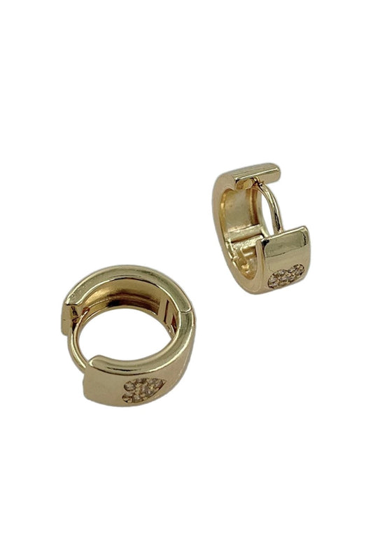 Gold Delicate elegance meets everyday wearability with these 14K gold dipped huggie hoops. Crafted from hypoallergenic brass and adorned with cubic zirconia pavé detailing, these petite 1cm hoops deliver subtle sparkle without the commitment of larger styles. Perfect for sensitive ears, they're lead and nickel compliant for worry-free wear. The lightweight design makes them ideal for all-day comfort, whether you're layering them with other pieces or letting them shine solo.