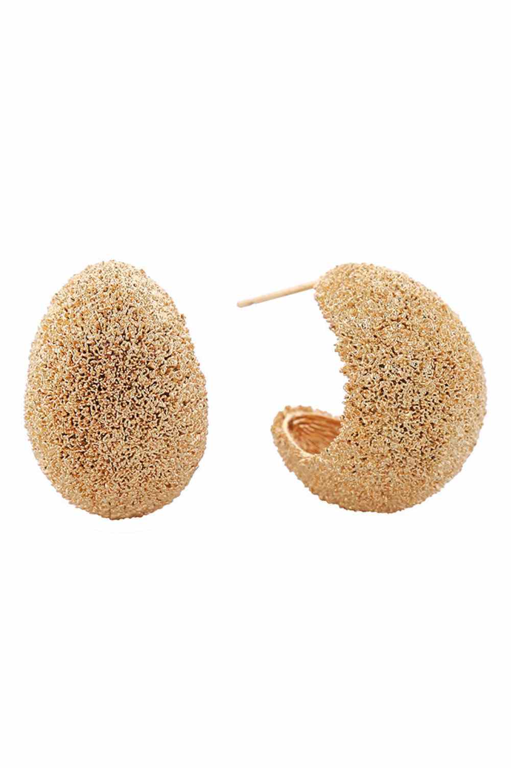 Gold Elegant crescent-shaped post earrings featuring a delicate grain texture finish. Crafted from hypoallergenic brass with 14K gold and white dipping for a luxurious look. Each earring measures 2.6cm in diameter, offering a refined statement without overwhelming the ear. Lead and nickel compliant, making them safe for sensitive skin. Perfect for everyday wear or special occasions.