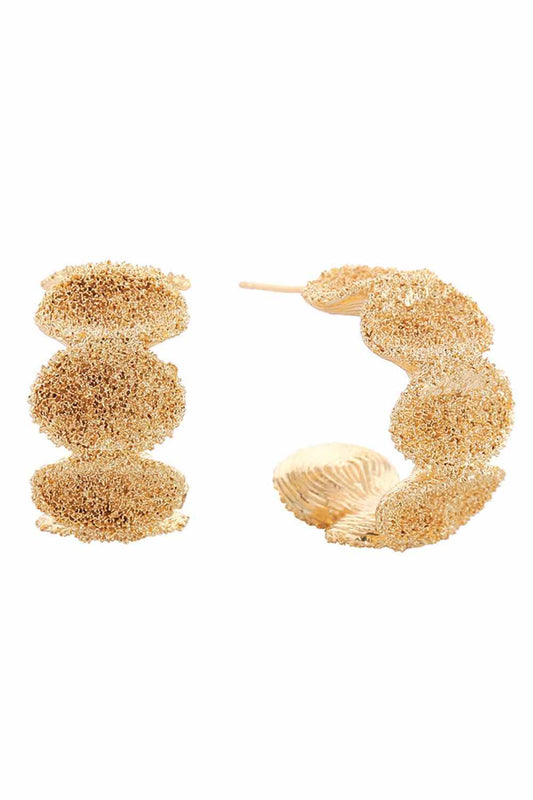 Gold Elevate your everyday look with these stunning 14K Gold/White Dipped Grain Texture Grumple Post Earrings. Crafted from hypoallergenic brass, these earrings feature a unique textured design that catches the light beautifully. With a comfortable 2.2cm diameter, they're the perfect size for both casual and dressy occasions. Lead and nickel compliant, these earrings are safe for sensitive skin. The secure post backing ensures they stay in place all day long. A versatile addition to any jewelry collection.