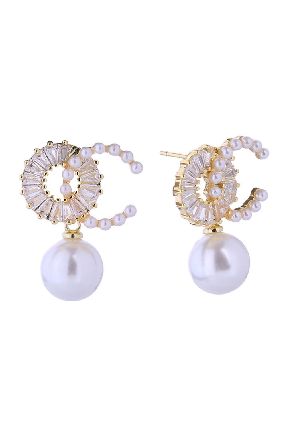 Gold Elegant pearl drop earrings crafted with 14K gold and white gold dipping for a luxurious finish. Featuring lustrous O-C pearls paired with sparkling cubic zirconia accents, these hypoallergenic posts are gentle on sensitive ears. Measuring 2cm, they offer the perfect balance of sophistication and wearability. 