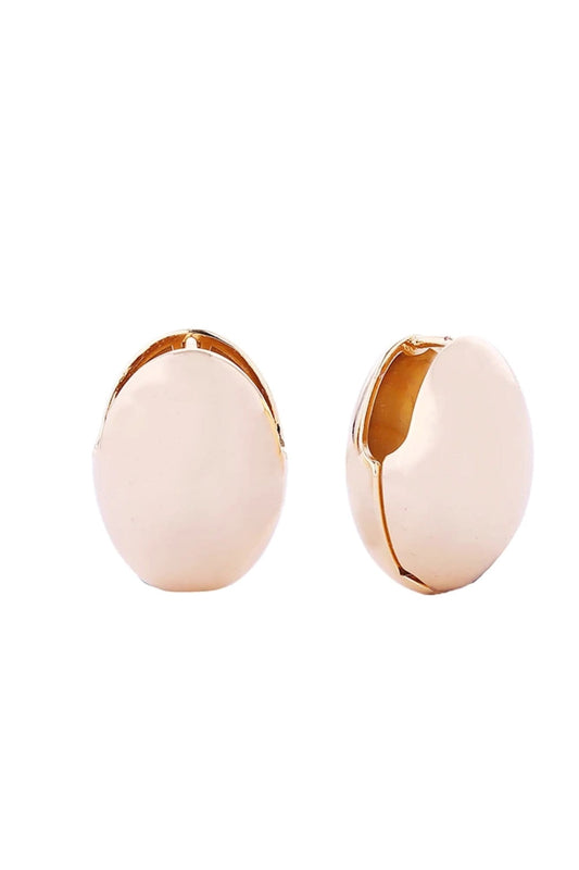 Gold Elegant oval dome huggie earrings crafted in 14K gold or white gold-dipped brass. These hypoallergenic earrings feature a sophisticated curved design that hugs the earlobe beautifully. With a 1.7cm diameter, they offer the perfect balance of presence and comfort for everyday wear or special occasions. Lead and nickel compliant for sensitive skin. Expertly made in Korea with attention to quality and detail.