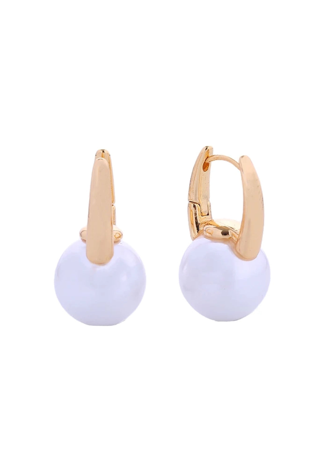 Gold Elegant pearl drop huggie earrings crafted in 14K gold or white gold-dipped brass. These hypoallergenic earrings feature lustrous pearls suspended from a secure huggie design, perfect for everyday wear or special occasions. Diameter: 1.7cm Lead and nickel compliant for sensitive skin Handcrafted in Korea 