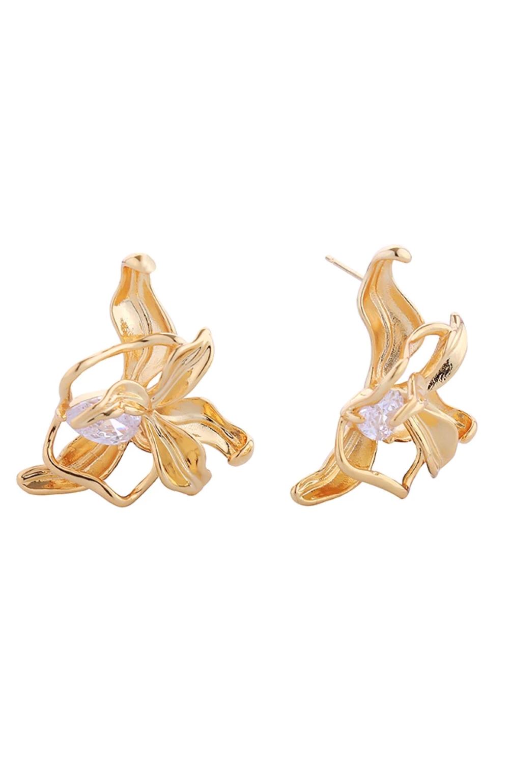 Gold Delicate petite flower studs crafted in brass with a luxurious 14K gold and white dip finish. Each bloom features sparkling cubic zirconia pavé detailing for timeless elegance. At 3cm in diameter, these hypoallergenic post earrings are perfect for everyday wear and sensitive ears. Lead and nickel compliant for peace of mind.