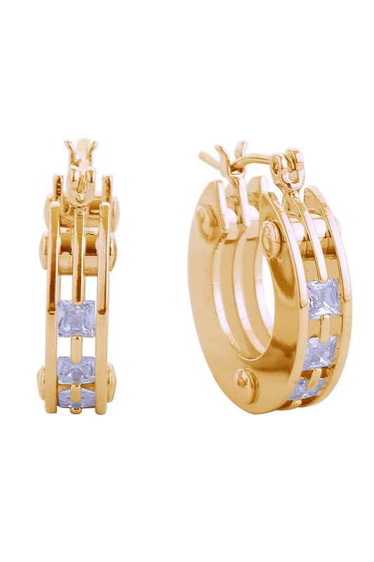 Gold Elevate your everyday look with these stunning 14K Trio Layer Hoop Pincatch Earrings. Featuring a sophisticated three-layer design, these hoops measure 2.6cm in diameter for a refined, versatile size that works for any occasion. Crafted from hypoallergenic brass with sparkling cubic zirconia accents, these earrings deliver luxury appeal without the luxury price tag. The secure pincatch closure ensures they stay in place throughout your day.