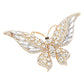 Gold Glass Crystal Butterfly Pin Brooch is expertly crafted with sparkling glass crystals, adding a touch of elegance and sophistication to any outfit. With its timeless butterfly design, this tasteful accessory is perfect for any occasion. Enhance your ensemble with a touch of shimmer and charm.