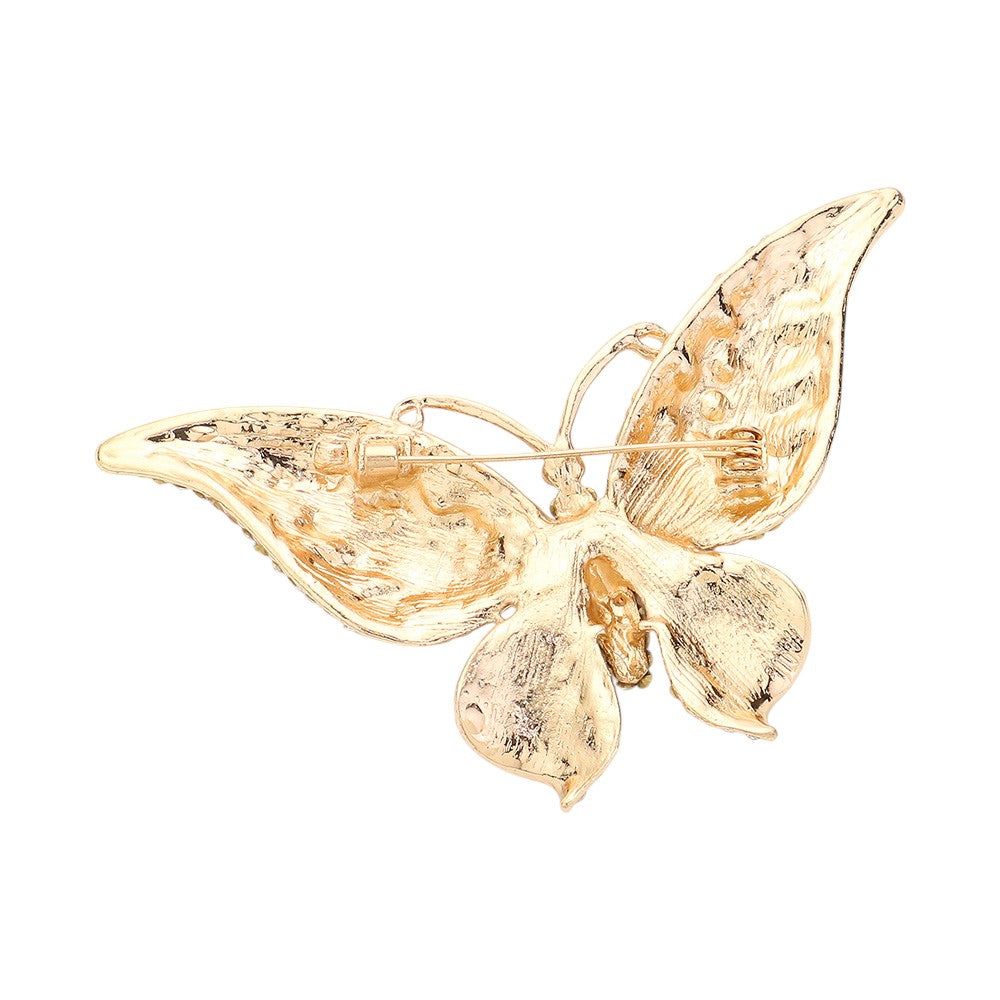 Gold Glass Crystal Butterfly Pin Brooch is expertly crafted with sparkling glass crystals, adding a touch of elegance and sophistication to any outfit. With its timeless butterfly design, this tasteful accessory is perfect for any occasion. Enhance your ensemble with a touch of shimmer and charm.