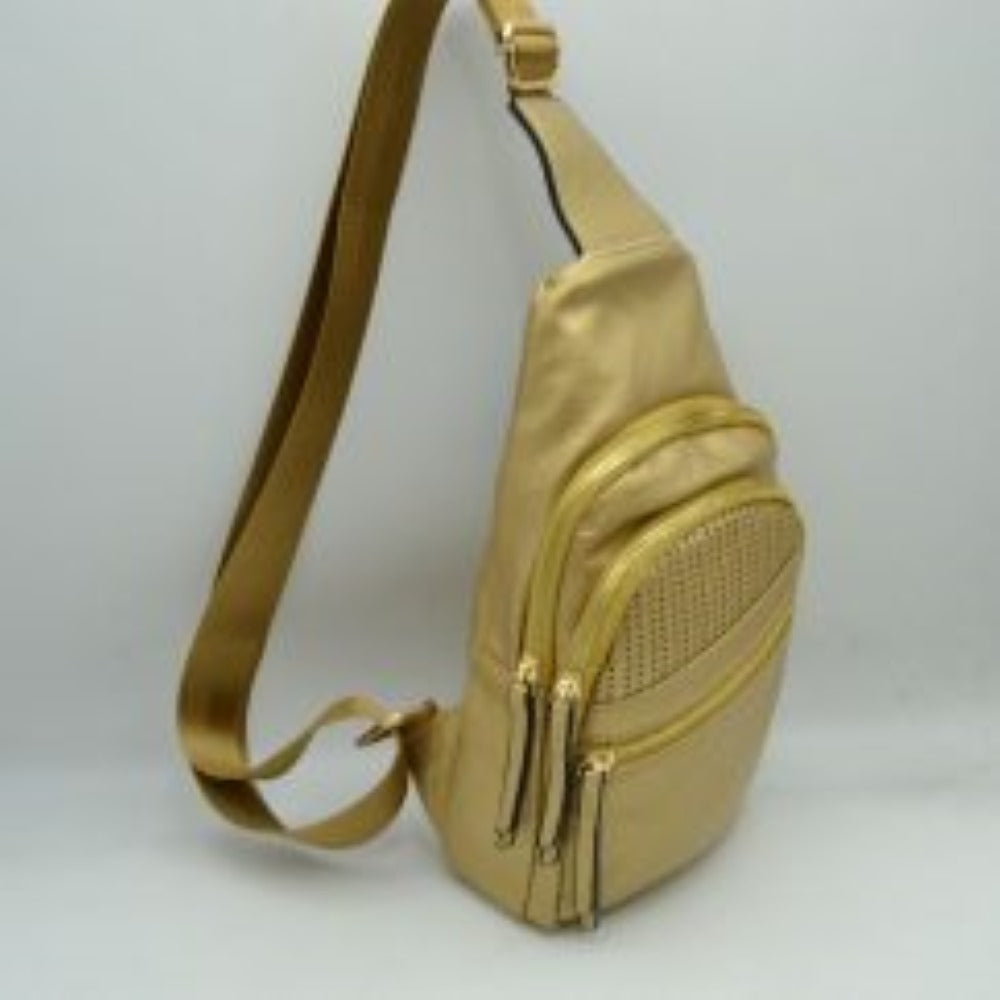 Gold This versatile sling bag features an asymmetric silhouette decorated with an arched, perforated pattern on the front panel, making it suitable for everyday use. It offers multiple organized storage compartments, including a main curved section, a mid-sized front zippered pouch, and a smaller diagonal zippered pocket near the base, all equipped with elongated pull tabs. Designed for convenience, the bag is completed with a single wide