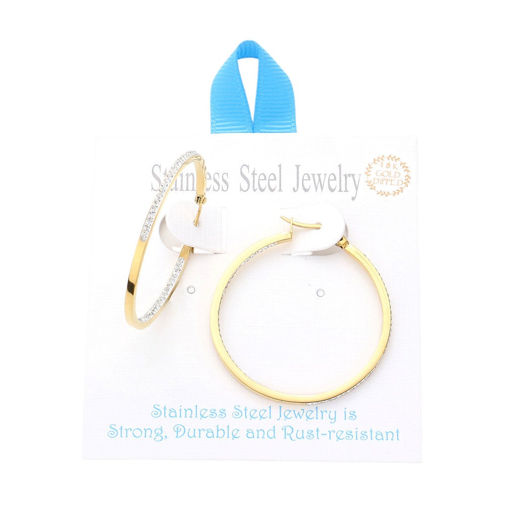 Gold 18K Gold Dipped Stainless Steel 1.7 Inch Inside Out Rhinestone Hoop Pin Catch Earrings feature a 1.7 inch Inside Out design with Rhinestone accents and a secure Pin Catch. Enjoy the classic elegance and durability of stainless steel, elevated with the luxury of gold. Perfect for any occasion, these earrings are a beautiful addition to any jewelry collection. 