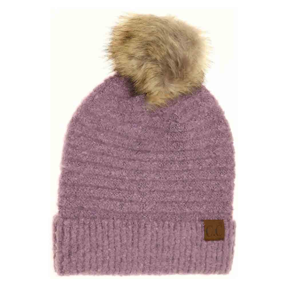 Grapeade Solid Boucle Knit Pom CC Beanie combines texture and warmth through its soft boucle knit fabric. Designed for expert-level comfort, this beanie features a classic silhouette topped with a playful pom for a refined yet casual look. Ideal for cold weather, it offers durable insulation while maintaining breathability, making it a versatile accessory for everyday wear. 